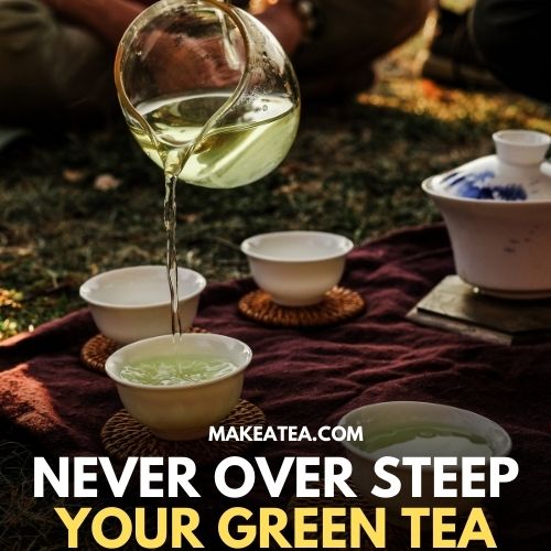 A pot of green tea poring in cups