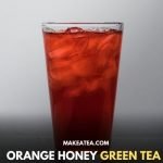 A chilled green tea with ice cubes