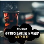 A cup of green tea with steam