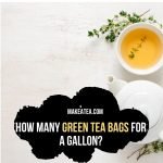 A white tea cup with green tea in it