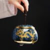 71c9841f-3d13-4c14-bb27-006e2ca47a00.jpg Golden Inlaid Jade Tea Pot Kung Fu Tea Set Large Sealed Tea Pot